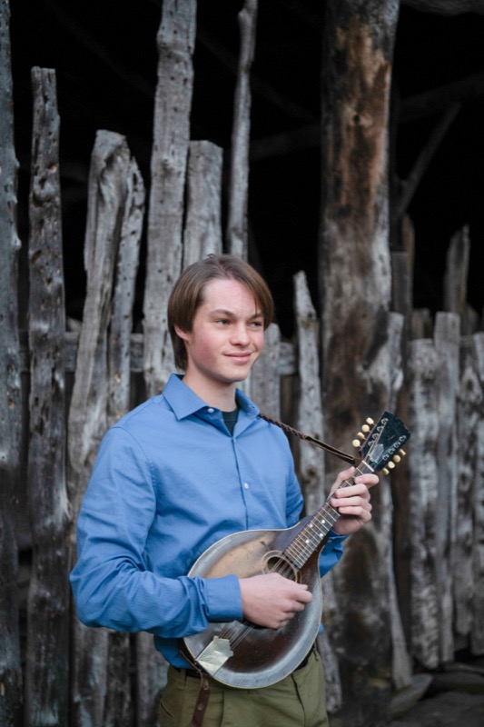 Tyler Weed playing mandolin